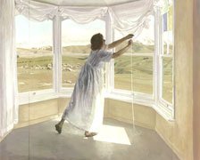 Woman drawing aside curtain
